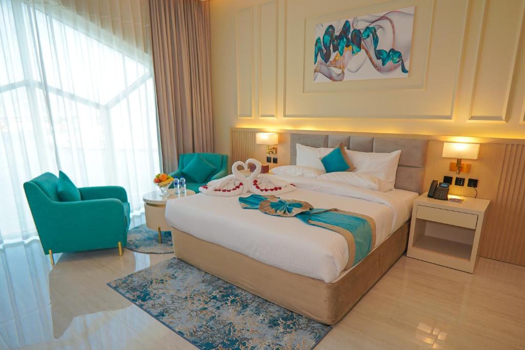 Postel nebo postele na pokoji v ubytování Concorde Creek View Hotel Bur Dubai