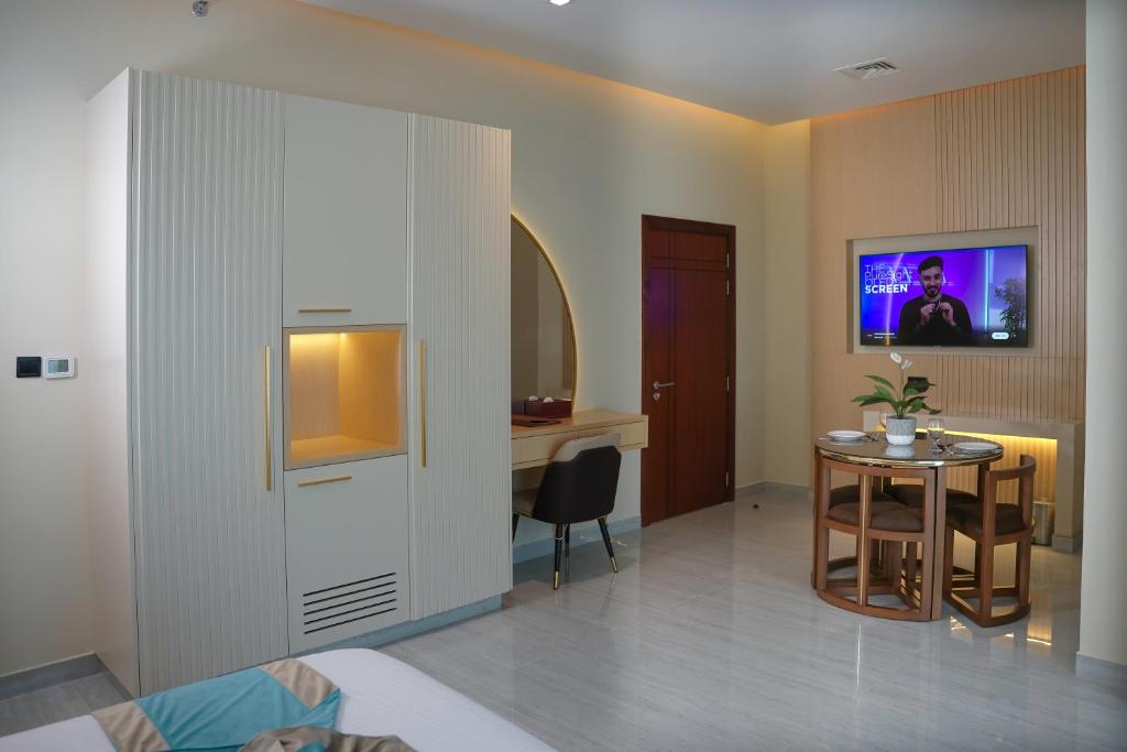 TV a/nebo společenská místnost v ubytování Concorde Creek View Hotel Bur Dubai