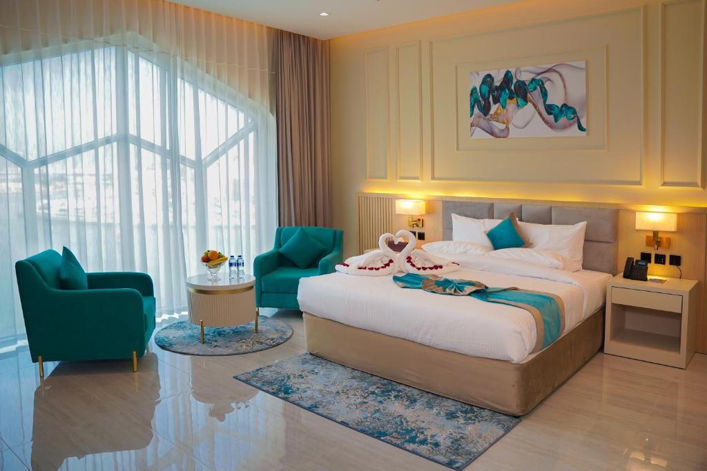Postel nebo postele na pokoji v ubytování Concorde Creek View Hotel Bur Dubai