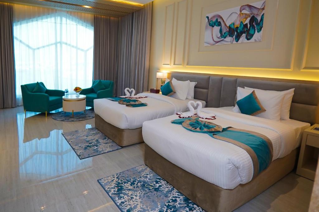 Postel nebo postele na pokoji v ubytování Concorde Creek View Hotel Bur Dubai