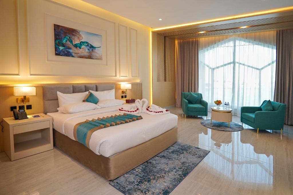 Postel nebo postele na pokoji v ubytování Concorde Creek View Hotel Bur Dubai