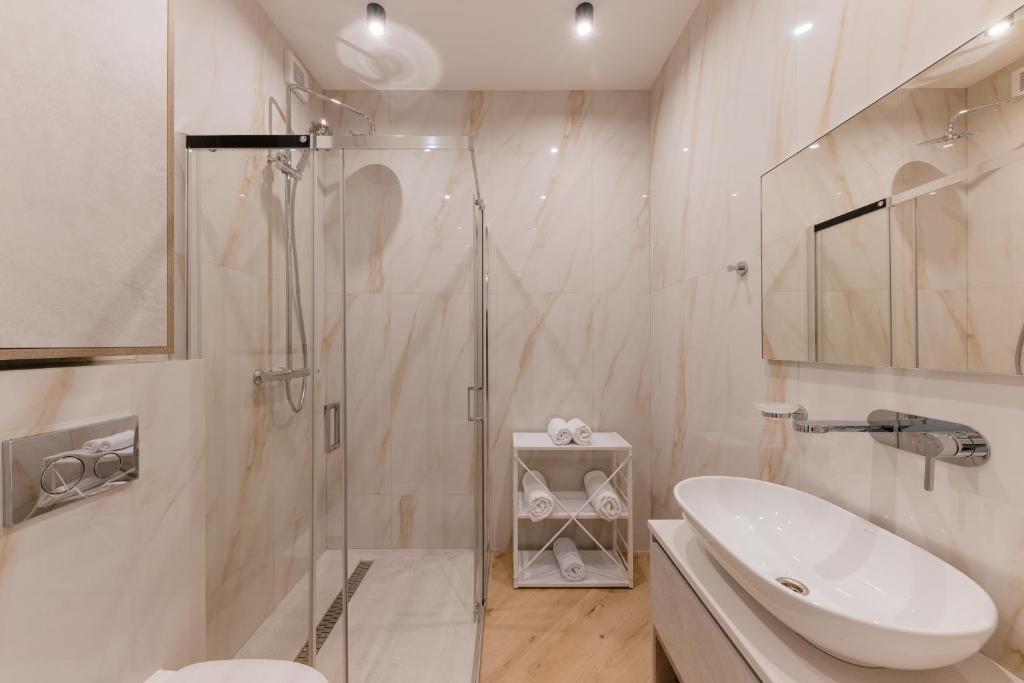 Koupelna v ubytování MM GROUP APARTMENT GOLD
