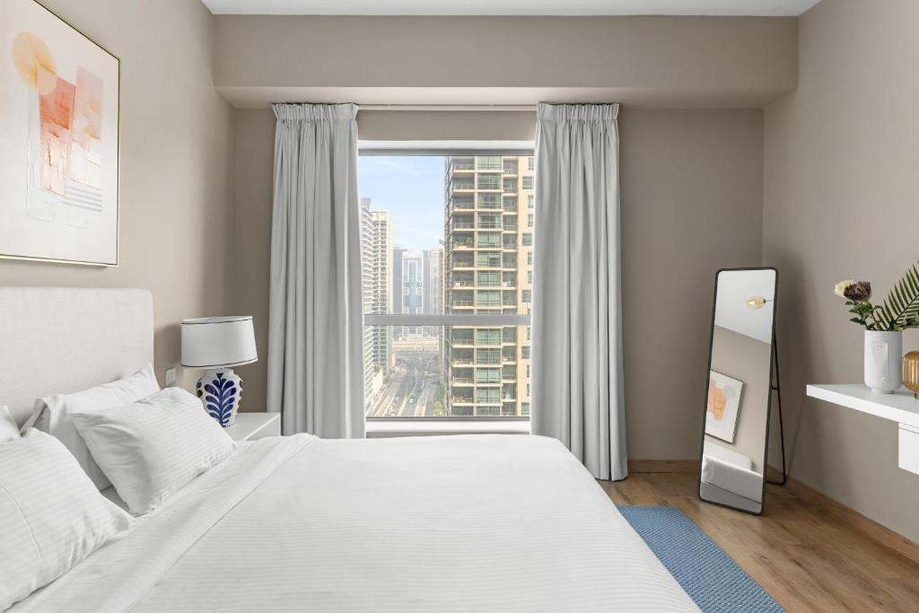 Postel nebo postele na pokoji v ubytování Rimal 1 - Jumeirah Beach Residence - Mint Stay