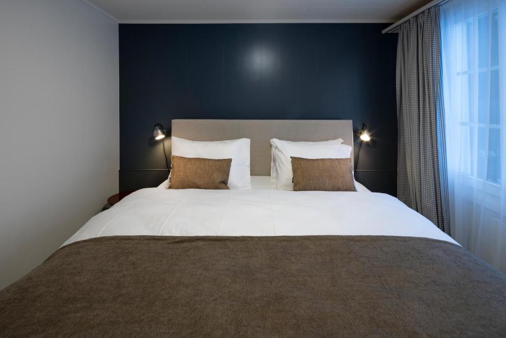 Postel nebo postele na pokoji v ubytování Hotel Bergidyll - Riders Haven