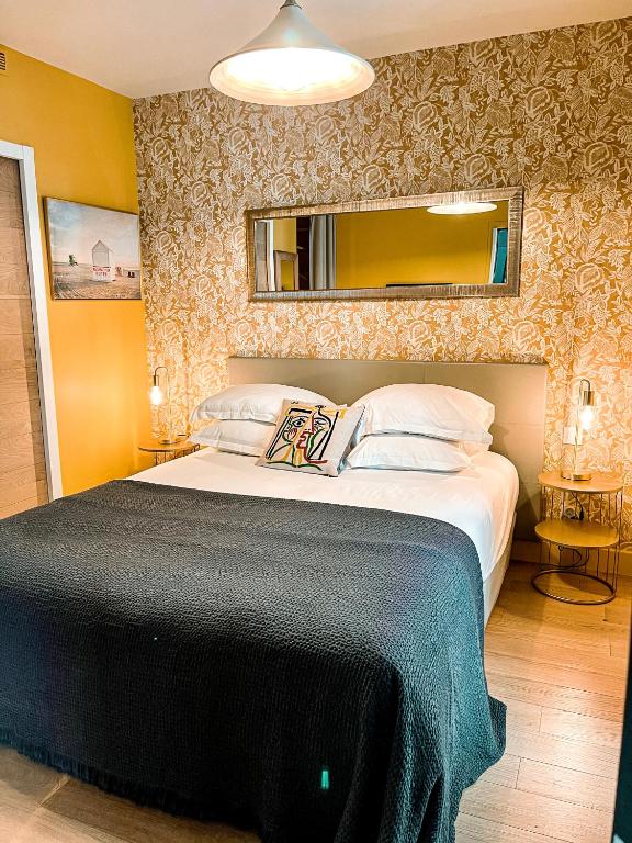 Łóżko lub łóżka w pokoju w obiekcie Cosy Room Paris
