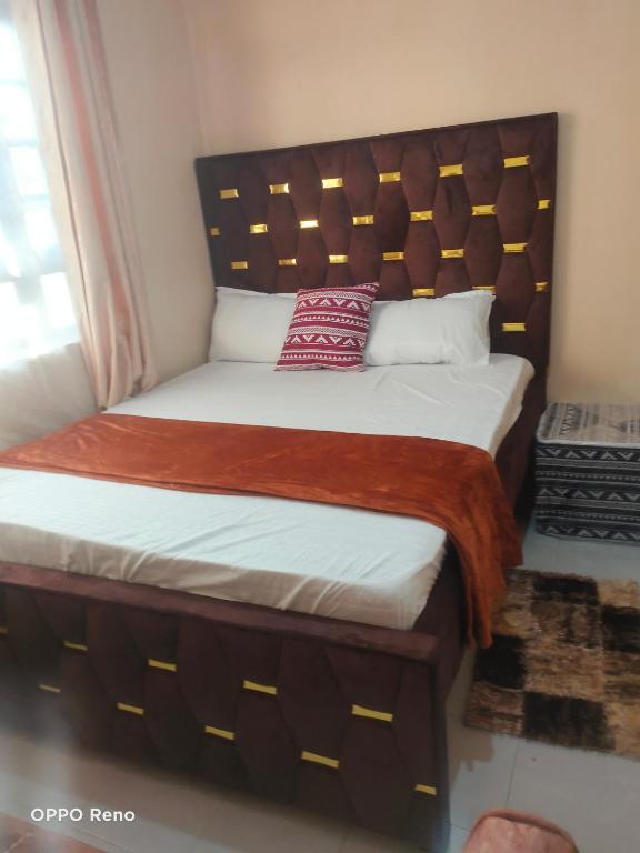 Postel nebo postele na pokoji v ubytování Two Bedroom Mombasa