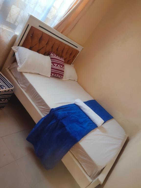 Postel nebo postele na pokoji v ubytování Two Bedroom Mombasa