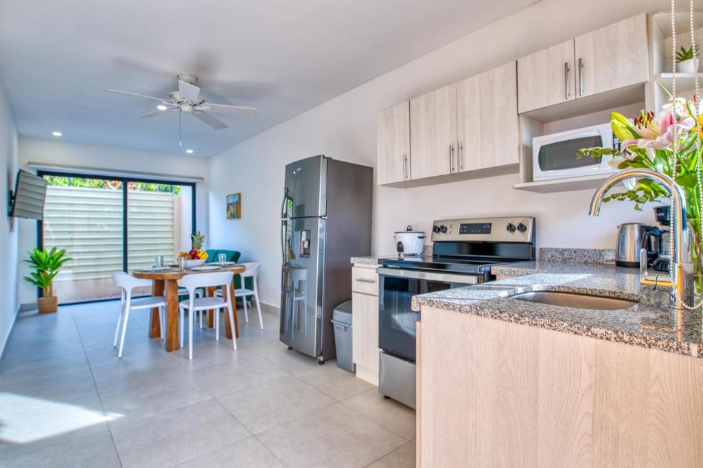 Kuchyň nebo kuchyňský kout v ubytování Muna Santa Rosa Apartamentos
