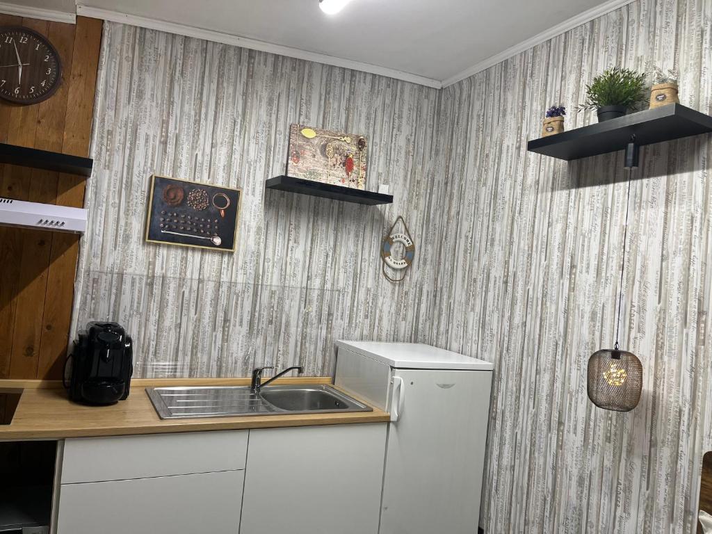Kuchyň nebo kuchyňský kout v ubytování Lo Chalet del Relax