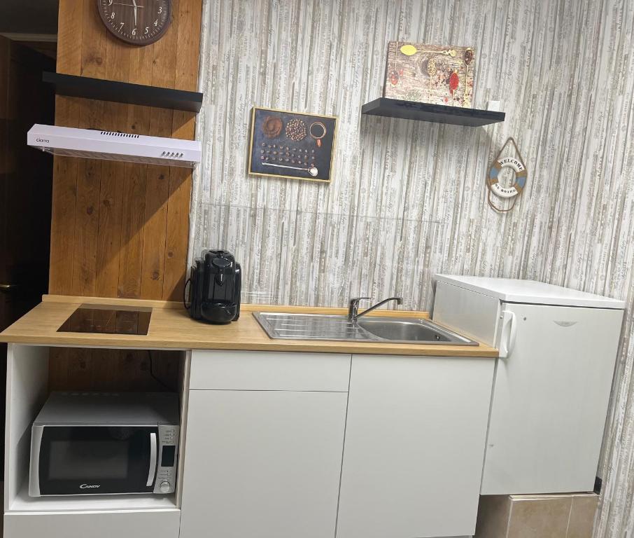 Kuchyň nebo kuchyňský kout v ubytování Lo Chalet del Relax
