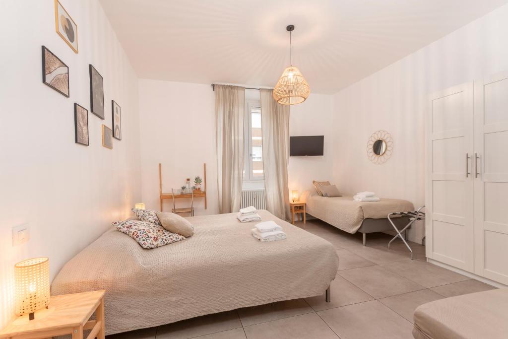 Llit o llits en una habitació de Guesthouse Tree Rooms Modern
