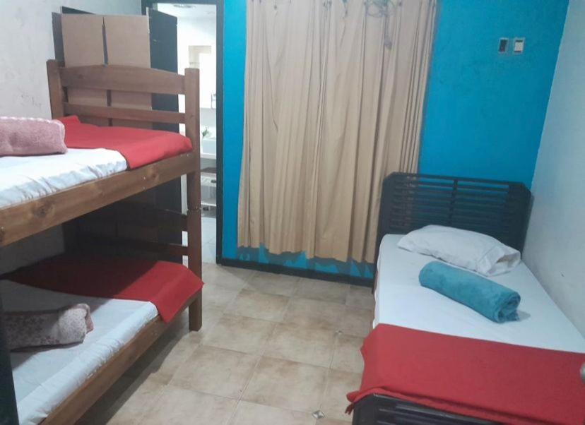 a room with two bunk beds in a room at Hostel Niterói in Niterói