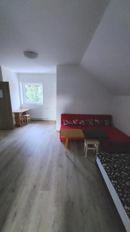 Postel nebo postele na pokoji v ubytování Dům Boubín