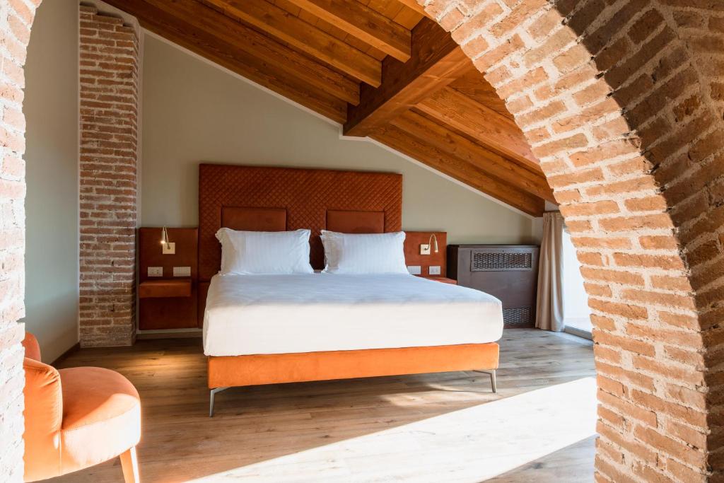 Postel nebo postele na pokoji v ubytování Pavillon Suite