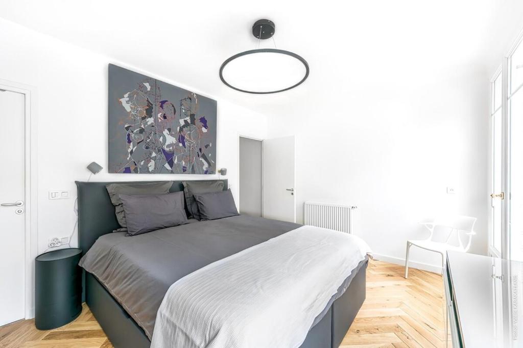Łóżko lub łóżka w pokoju w obiekcie Muette - Faisanderie 1bdr by B'Your Home