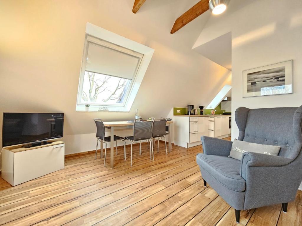TV/trung tâm giải trí tại Mienhus Apartments Ferienwohnung Palle