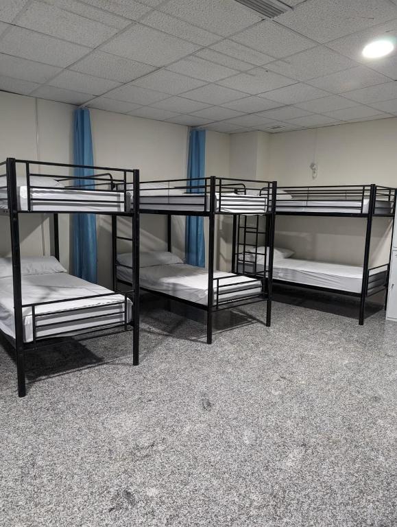 Postel nebo postele na pokoji v ubytování Hoomy Hostel