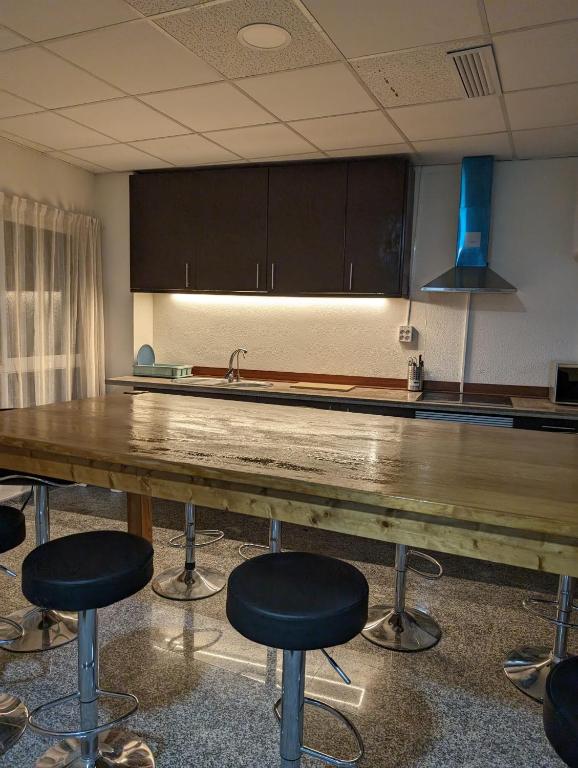 Kuchyň nebo kuchyňský kout v ubytování Hoomy Hostel