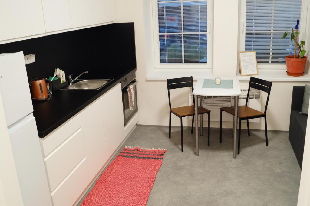Kuchyň nebo kuchyňský kout v ubytování Apartmány Atrium