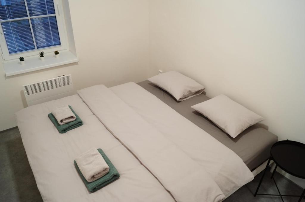 Postel nebo postele na pokoji v ubytování Apartmány Atrium