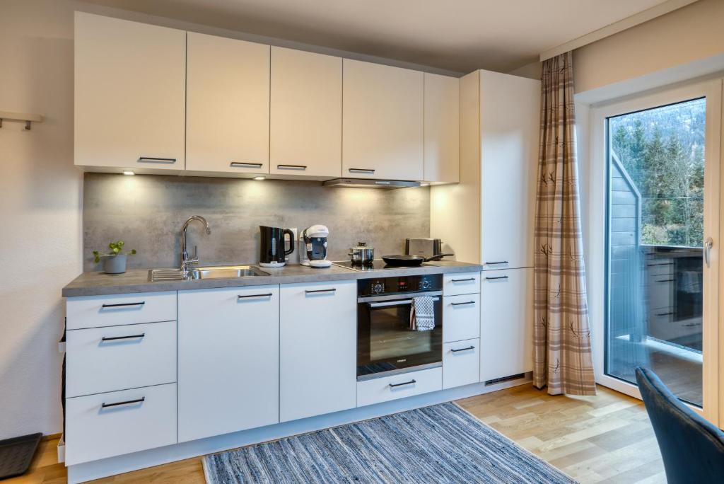 Kuchyň nebo kuchyňský kout v ubytování NA-Home Kitzbühel
