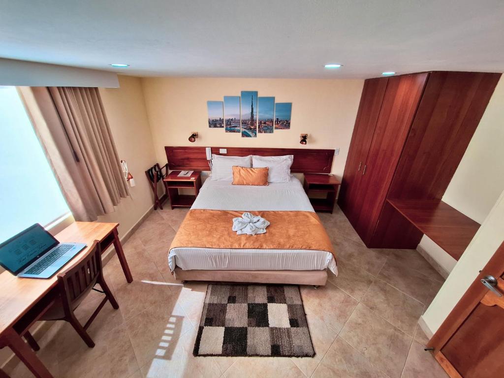 Ένα ή περισσότερα κρεβάτια σε δωμάτιο στο Hotel Estación Sabana