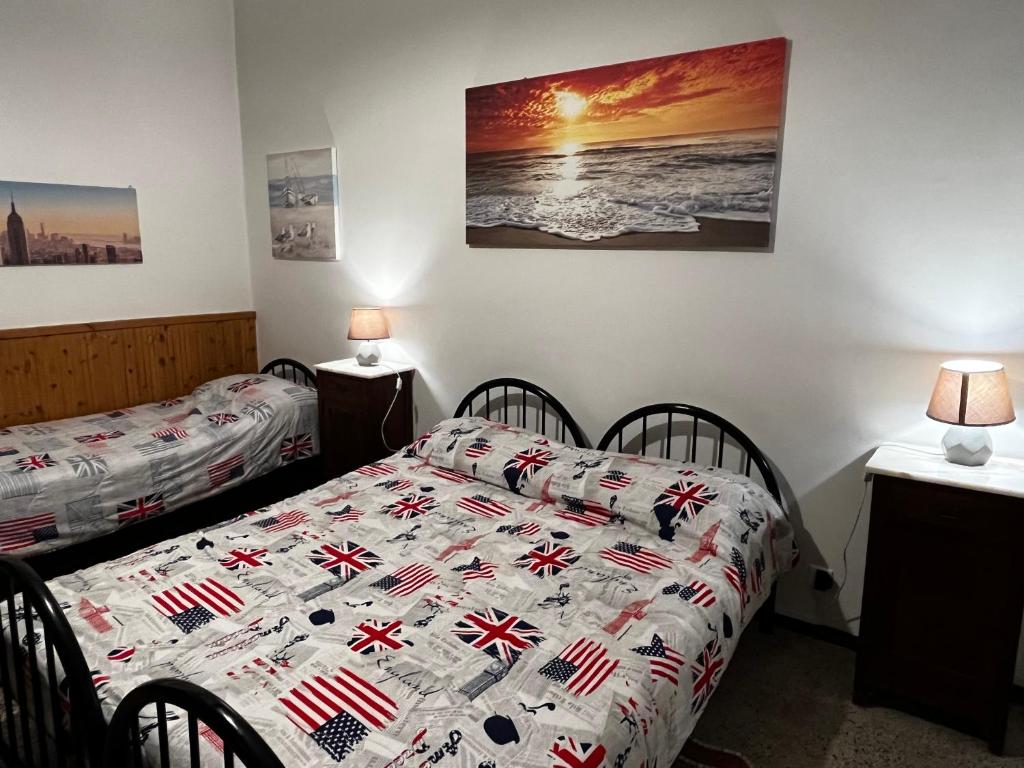 A bed or beds in a room at Casa ANNE vicino al centro, al mare, alla stazione