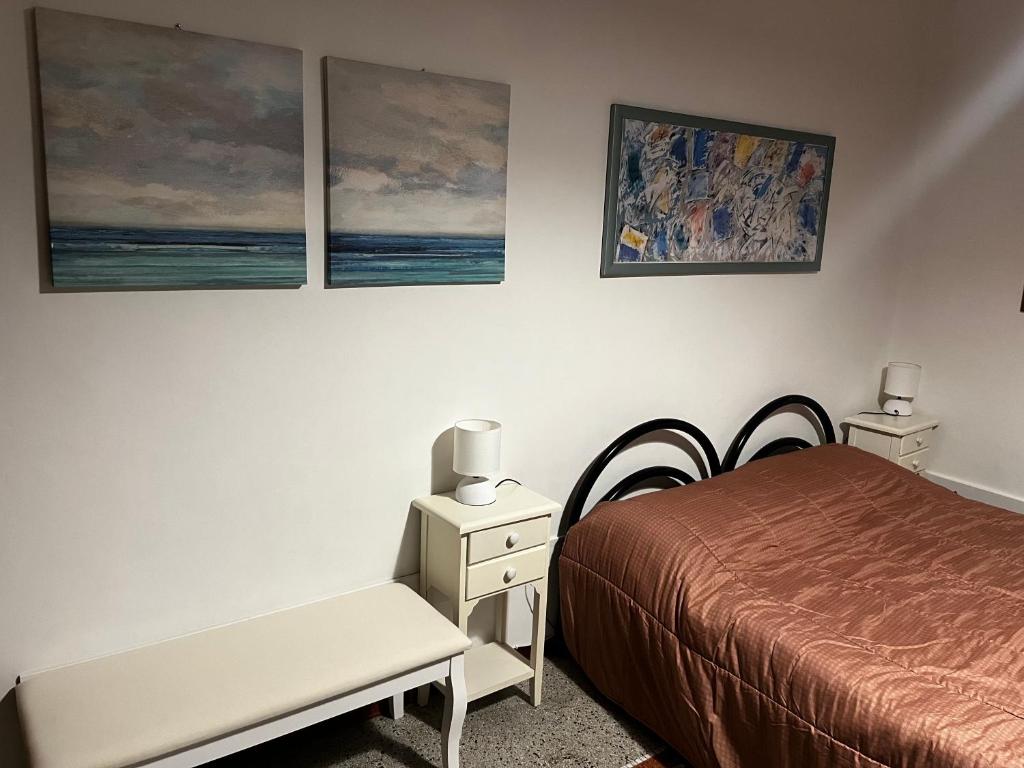 A bed or beds in a room at Casa ANNE vicino al centro, al mare, alla stazione