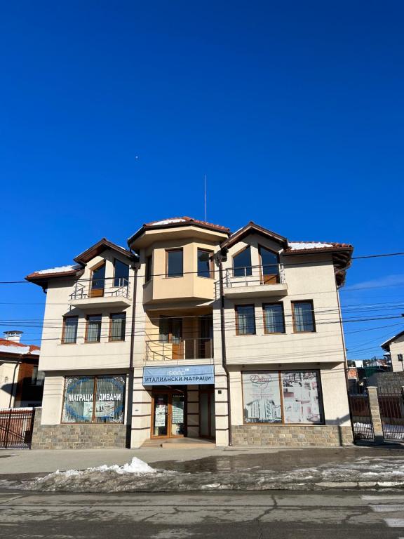 a building on the corner of a street at Rila Hills in Samokov
