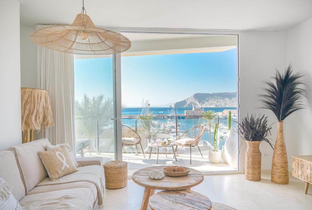 a living room with a view of the ocean at Coco Calpe in Calpe