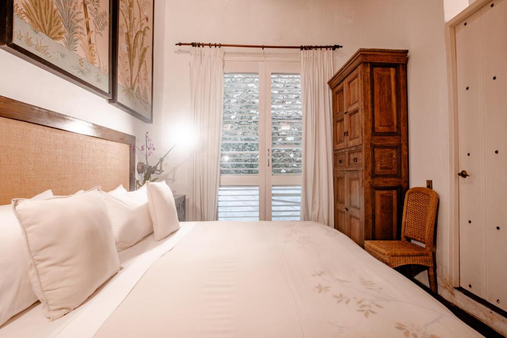 Postel nebo postele na pokoji v ubytování Amarla Boutique Hotel Cartagena