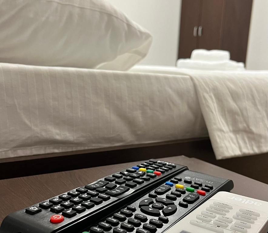 Postel nebo postele na pokoji v ubytování Apartmani Bosfor