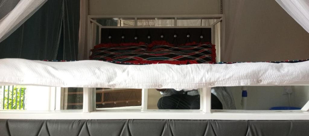 Двухъярусная кровать или двухъярусные кровати в номере Hotel Judith Laroo