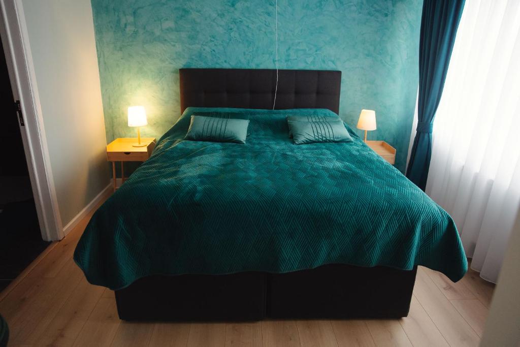 Postel nebo postele na pokoji v ubytování MD luxury