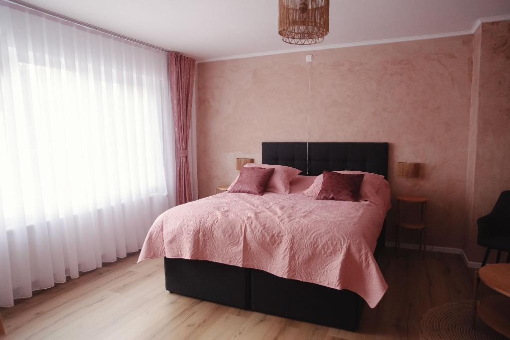 Postel nebo postele na pokoji v ubytování MD luxury