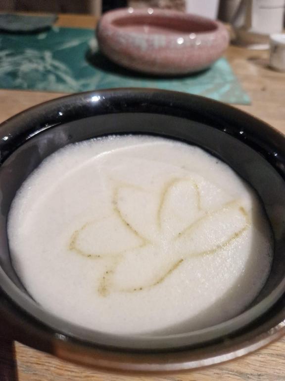 a bowl of food with a swirl in the liquid at Hidden Gem in the Highlands in Inverness