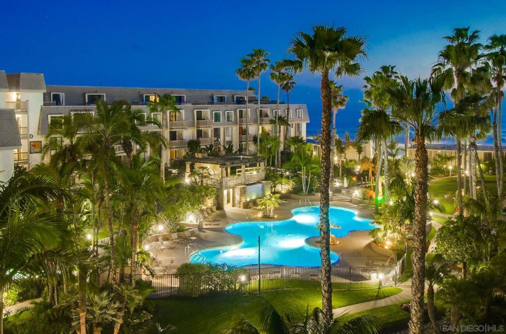 an aerial view of a resort with palm trees at Brooks Beach Vacations Bungalow B116 Oceanside in Oceanside
