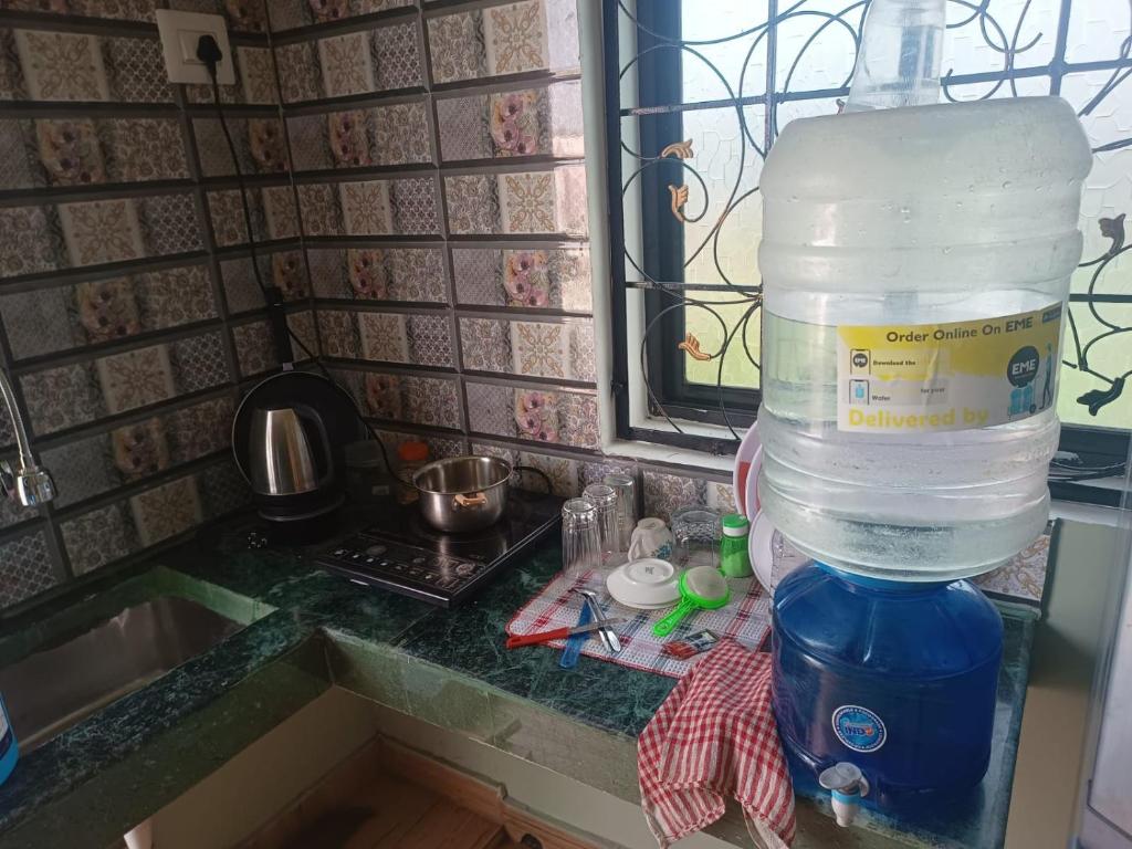 Kuchyň nebo kuchyňský kout v ubytování Pravuprasad Homestay
