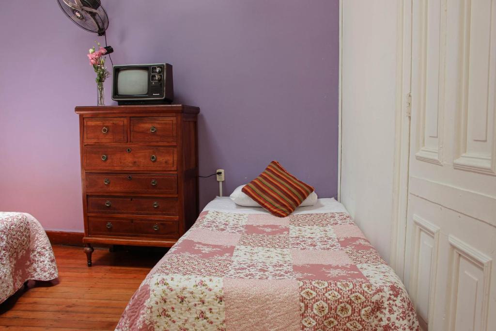 Postel nebo postele na pokoji v ubytování Nómada Eco-Hostal