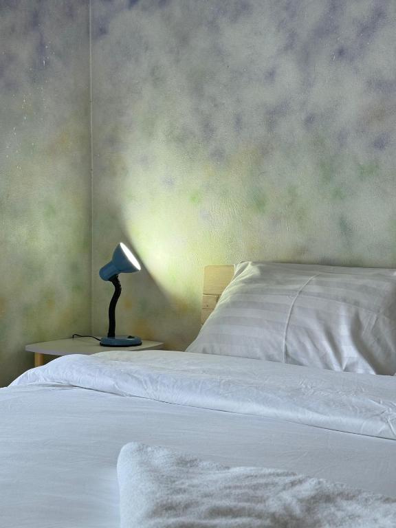 Postel nebo postele na pokoji v ubytování Sleep inn Samui