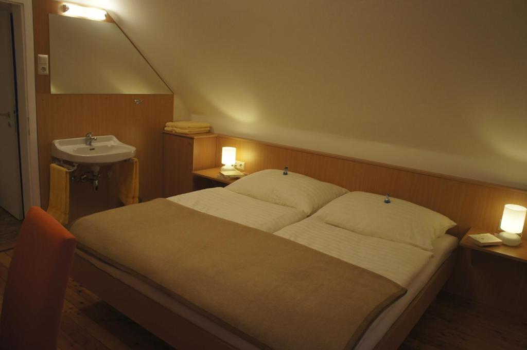 Posteľ alebo postele v izbe v ubytovaní Appartements Kronig