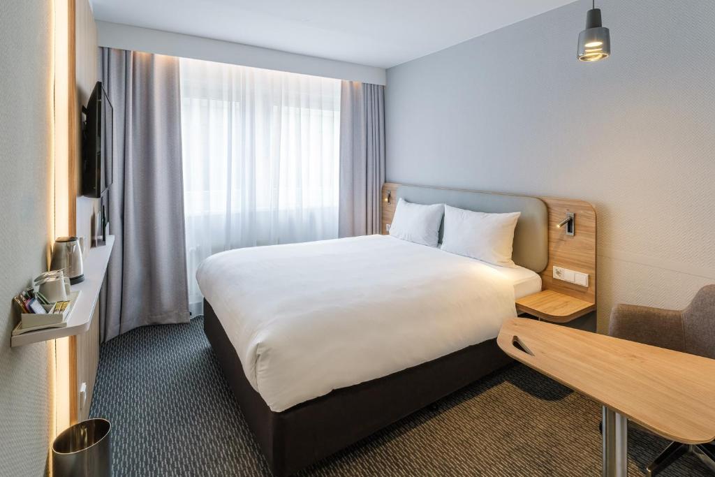 Postel nebo postele na pokoji v ubytování Holiday Inn Express Dresden Zentrum by IHG