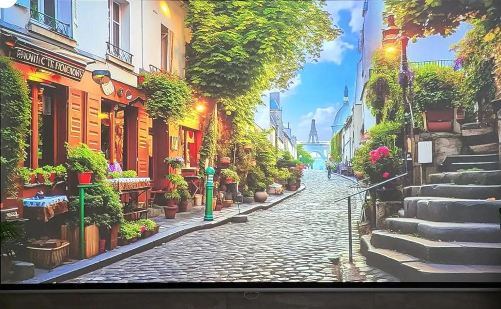 a picture of a cobblestone street with plants at Gaon guesthouse in Jeonju