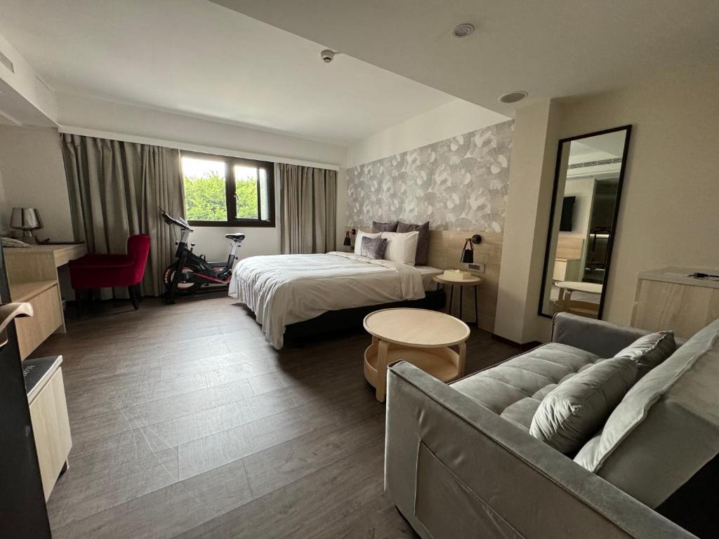 Postel nebo postele na pokoji v ubytování Delight Hotel