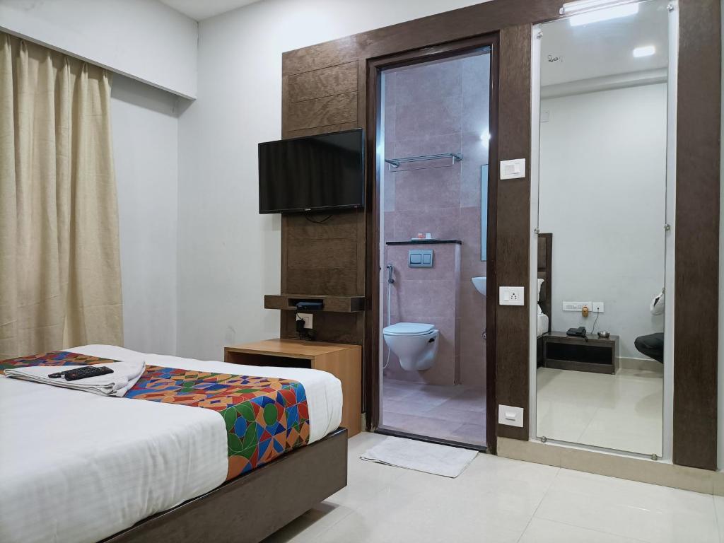 Postel nebo postele na pokoji v ubytování Hotel Zain Grande
