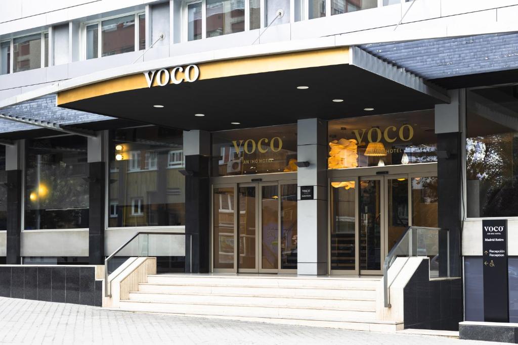 The facade or entrance of voco Madrid Retiro by IHG