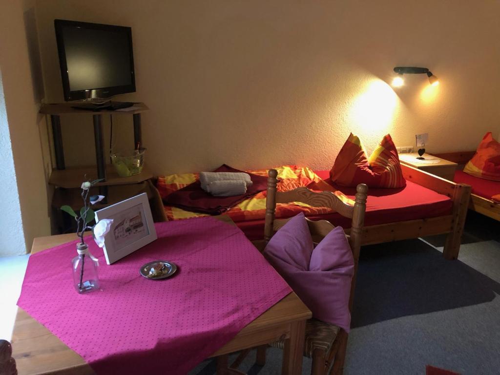 Postel nebo postele na pokoji v ubytování Pension Petersohn (ehem. Zur Heimat)