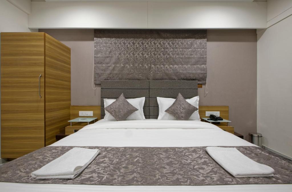 Katil atau katil-katil dalam bilik di HOTEL AURELLIA
