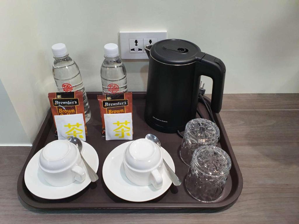Příslušenství pro přípravu čaje a kávy v ubytování 456 Hotel