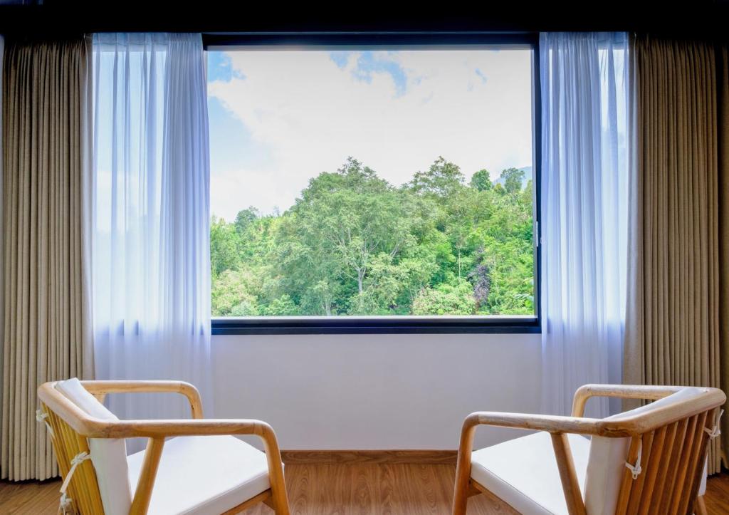 Photo de la galerie de l'établissement Giriwood Hotel & Villa, à Munduk